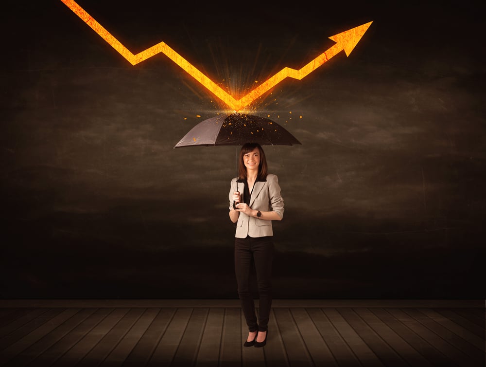 Businesswoman standing with umbrella keeping orange arrow concept on background